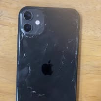 Black iPhone with cracked back glass