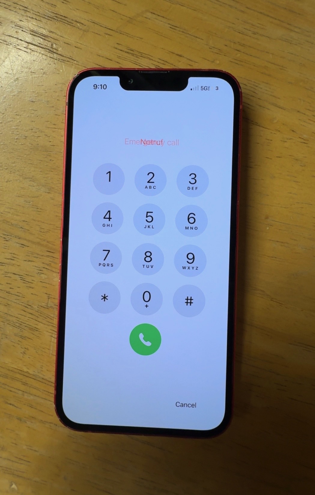 Same red iPhone fully restored with a clean working display