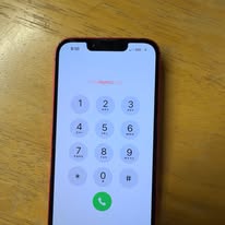 Same iPhone showing a working dialer screen after repair